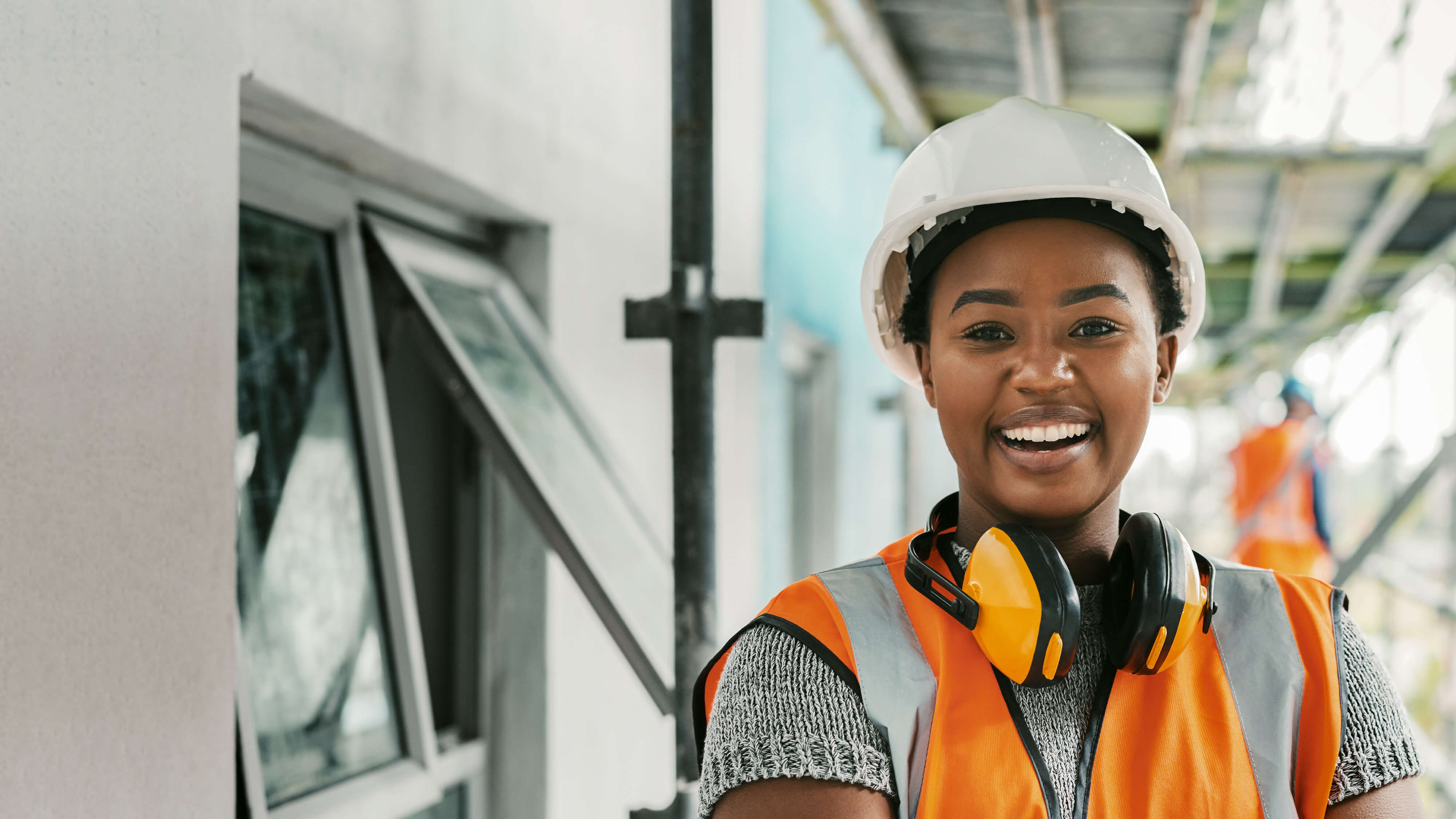 Trade worker smiling during a job.